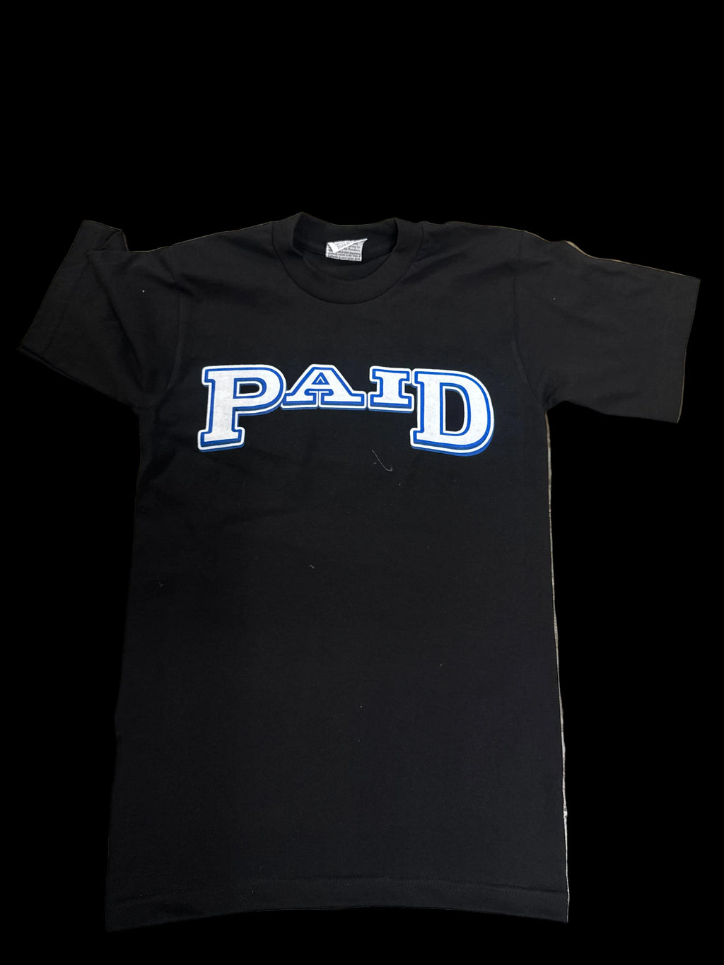 Front of PAID tshirt
