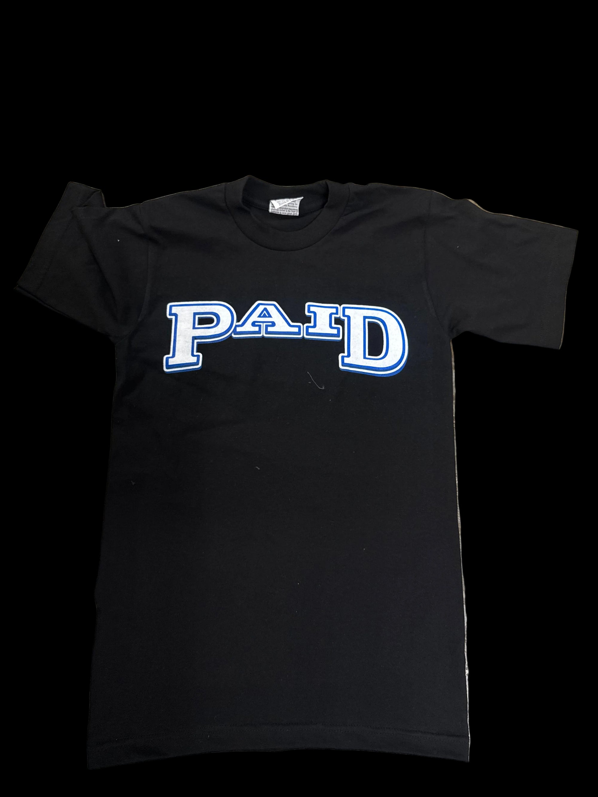Front of PAID tshirt